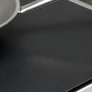 Caesarstone Jet Black Quartz worktop in a modern kitchen setting.
