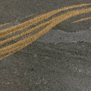 Neolith Aspen Grey with gold accents, ideal for elegant interiors