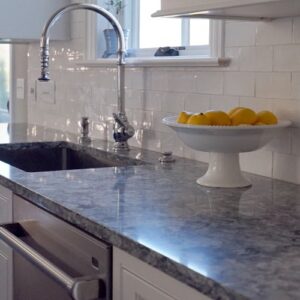 Kitchen with Unistone Azul Aran Quartz worktop in London home