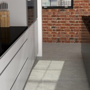 Contemporary kitchen with CRL Midnight Quartz countertops and brick wall backdrop.