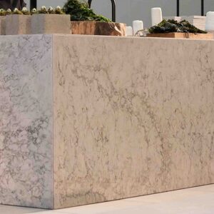 Modern kitchen island featuring Caesarstone Moorland Fog Quartz in a Surrey home.