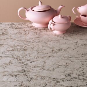 Caesarstone Moorland Fog Quartz countertop with pink tea set in a London kitchen.