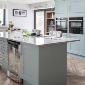 Kitchen with CRL Soft Concrete Quartz island in a contemporary design