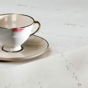 Elegant Caesarstone Aterra Blanca quartz countertop with a teacup in a London kitchen
