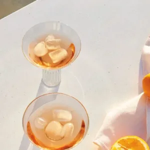 Caesarstone Midday Quartz worktop with drinks and oranges