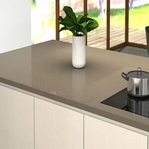 Modern kitchen with CRL Midnight Quartz worktop, featuring a sleek design in a bright room.