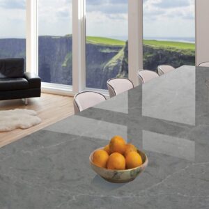 Modern kitchen with CRL Pearl Grey Quartz worktop overlooking a coastal view