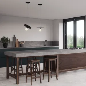 Modern kitchen featuring Caesarstone Concrita worktop with dark cabinetry and pendant lighting.