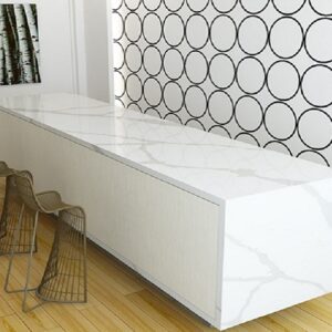 Minimalist kitchen island featuring Unistone Calacatta Toscane Quartz surface.