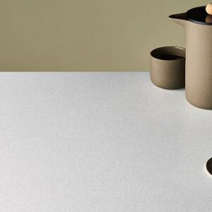 Caesarstone Intense White surface with coffee set and biscuits