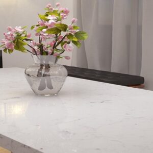 Dining table with Unistone Onyx Quartz surface and floral decor