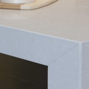 Unistone Botticino quartz countertop in a modern kitchen setting, highlighting its elegant finish.