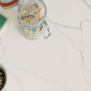 CRL Calacatta Quartz kitchen worktop with tea and snacks, ideal for homes in Surrey.