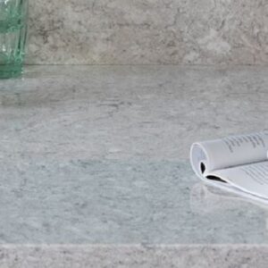 CRL Montana Gris Quartz kitchen worktop with a cup of tea and biscuits