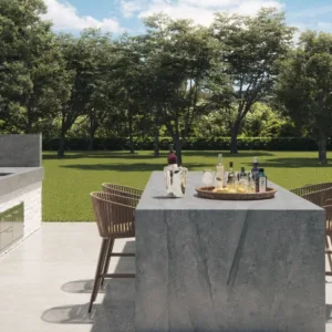 Outdoor kitchen featuring Caesarstone Monumental Porcelain worktop in a garden setting.