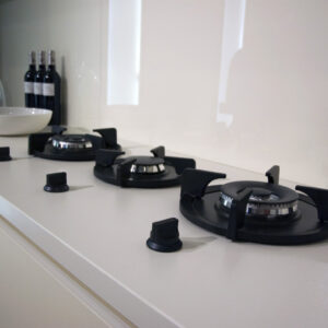 Neolith Nieve worktop in a modern kitchen with gas hobs, London, UK.