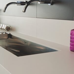 Close-up of Neolith Avorio worktop with sink, ideal for elegant kitchens in Surrey.
