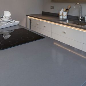 Modern kitchen with CRL Windsor Grey Quartz island in Surrey