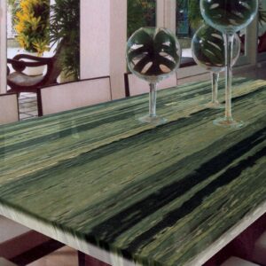 Dining table with Green Bamboo Quartzite top in a modern setting