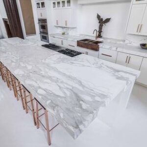 Modern kitchen featuring Calacatta Bettogli Marble countertops in a spacious layout