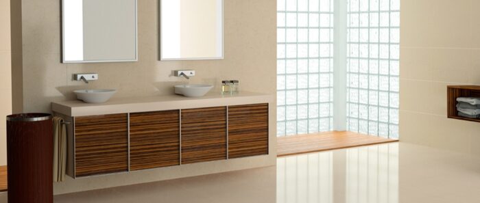 Flooring Bathroom interior featuring Crema Valencia Composite Marble surfaces in a modern setting.