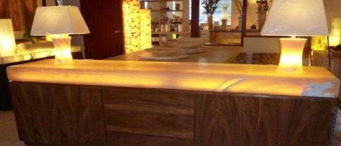 Flooring Luxurious kitchen island featuring illuminated Golden Onyx Granite in a modern setting