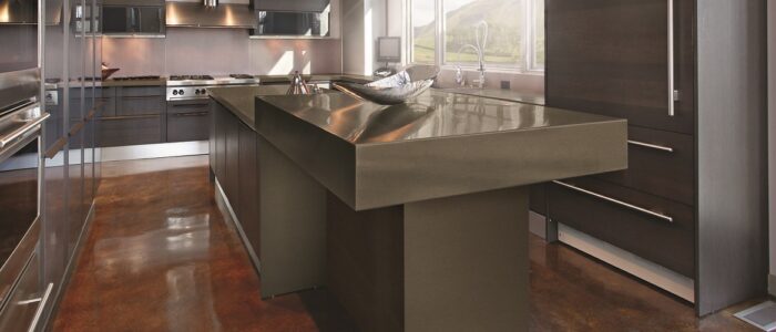 Flooring Modern kitchen with Cambria Brightstone Quartz worktop in a London home.