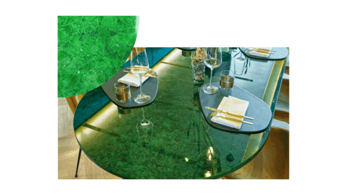 Tiles & Walls Dining table with Magna Glaskeramik Green glass top in a stylish setting