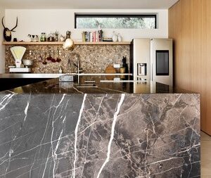 Bronze Fantasy Marble kitchen island in a contemporary kitchen.