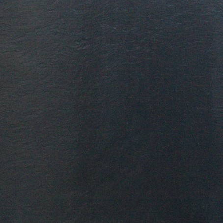 Black Slate Riven - Worktops Close-up of Black Slate Riven's fine grain texture