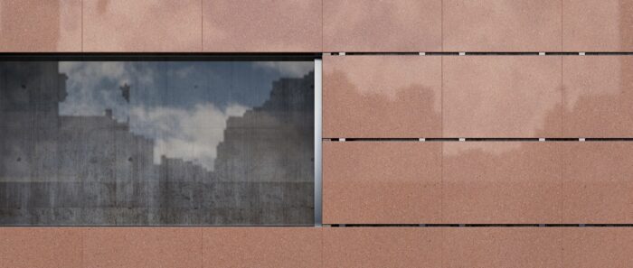 Tiles & Walls Compac Cuivre cladding with reflective window