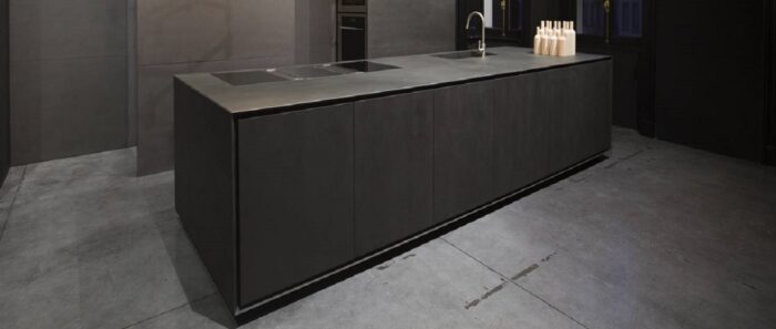 Flooring Modern kitchen island featuring Laminam Seta Liquorice in London