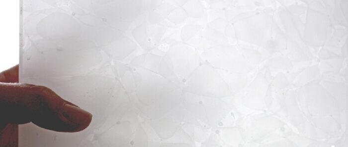 Flooring Close-up of Magna Glaskeramik Polar White sintered glass surface
