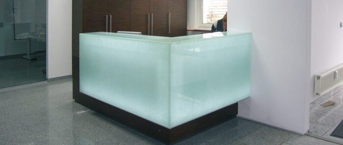 Flooring Reception desk featuring Magna Glaskeramik Jade Green in a modern office
