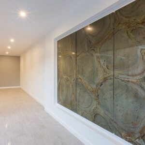 Interior view featuring Green Turtle Quartzite wall in a modern London home.