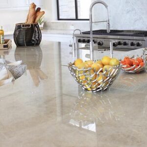 Modern kitchen featuring a Perla Venata Quartzite worktop with elegant decor.