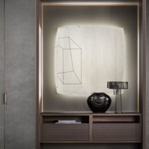 Contemporary interior with Laminam Seta Gris panels and decorative elements.