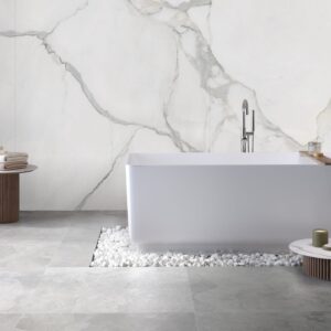 Bathroom featuring Statuario Alto Marble walls, showcasing luxury in a UK home.