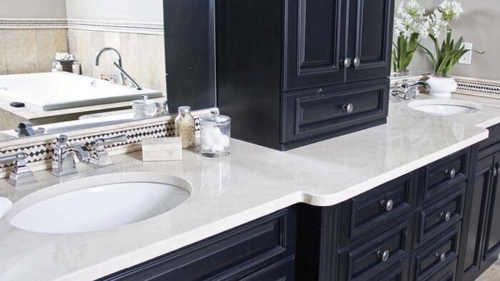 Flooring Bianco Rhino Marble countertop in a luxurious bathroom setting.