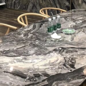 Dining table crafted from Arabescato Orobico Marble, showcasing its elegant patterns.