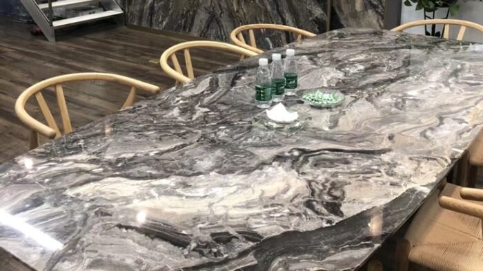 Tiles & Walls Dining table crafted from Arabescato Orobico Marble, showcasing its elegant patterns.