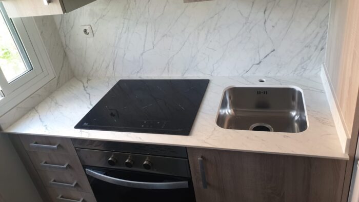 Tiles & Walls Laminam Statuarietto surface installed in a contemporary kitchen in London, UK.