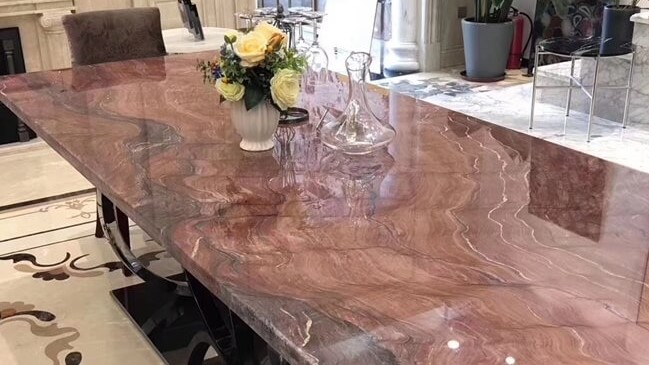 Flooring Luxurious Revolution Quartzite table in a modern kitchen setting, London, UK