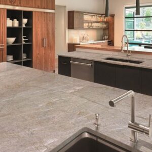 Modern kitchen featuring Victoria Falls Quartzite worktops in London