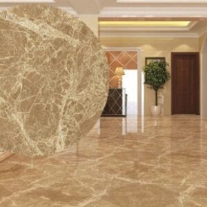 Luxurious interior featuring Emperador Light Marble flooring in a spacious living room