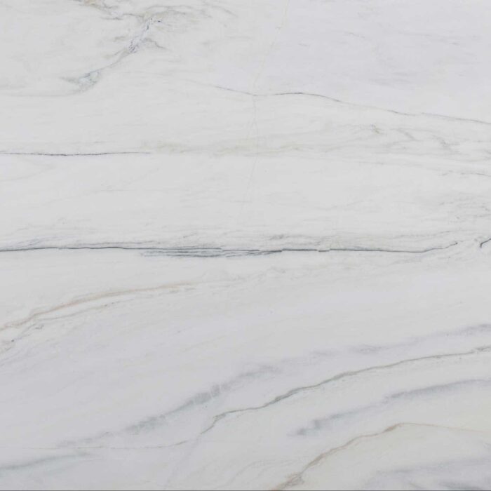Bianco Lasa Marble - Worktops Close-up of Bianco Lasa Marble with creamy white background and golden veining.