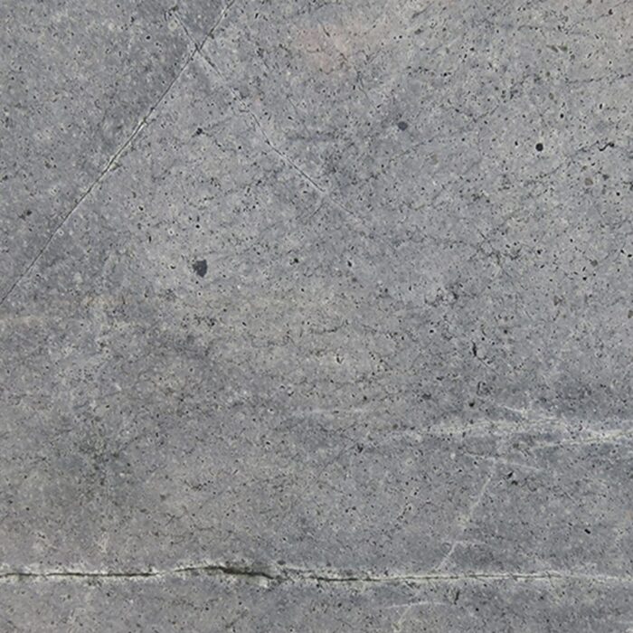 Atlantic Sky Blue - Worktops Close-up of Atlantic Sky Blue Marble with dark veins on a blue-grey background