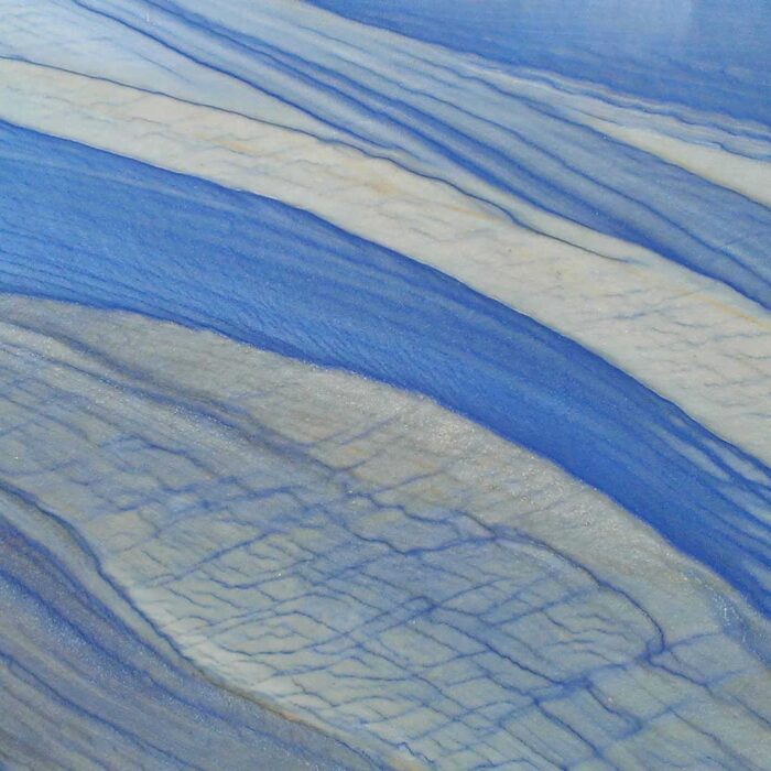 Azul Macaubas Quartzite - Worktops Close-up of Azul Macaubas Quartzite with sky blue base and dark blue veins, ideal for luxurious interiors in London.