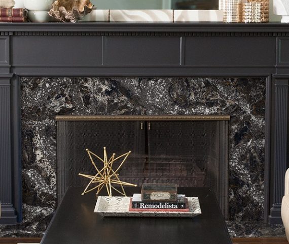 Flooring Cambria Ellesmere Quartz fireplace surround in a stylish London living room