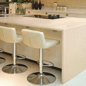 Stylish kitchen island featuring Cambria Fairbourne Quartz with bar stools